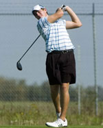 Image of man golfing