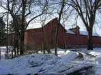 Image of a barn with trees
