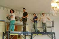 Image of people on scaffold working on the Octagon Room