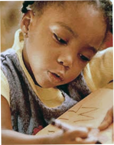Image of child writing letters