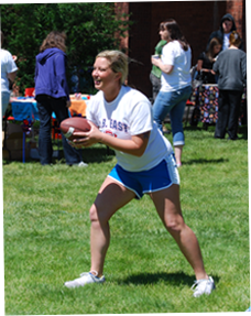 Image of female holding football