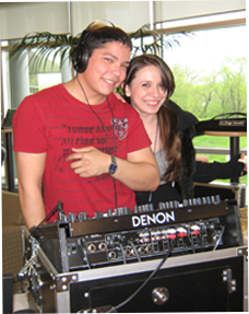 Image of male and female students working on an equalizer
