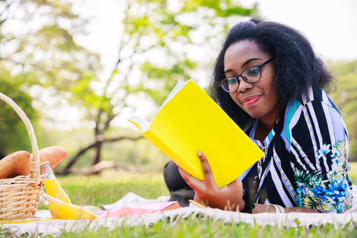 Student reading outside