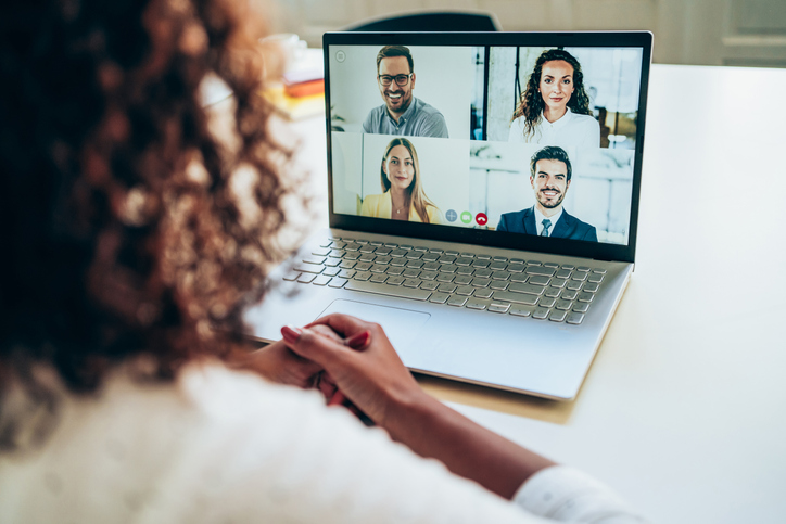 woman watching video conference