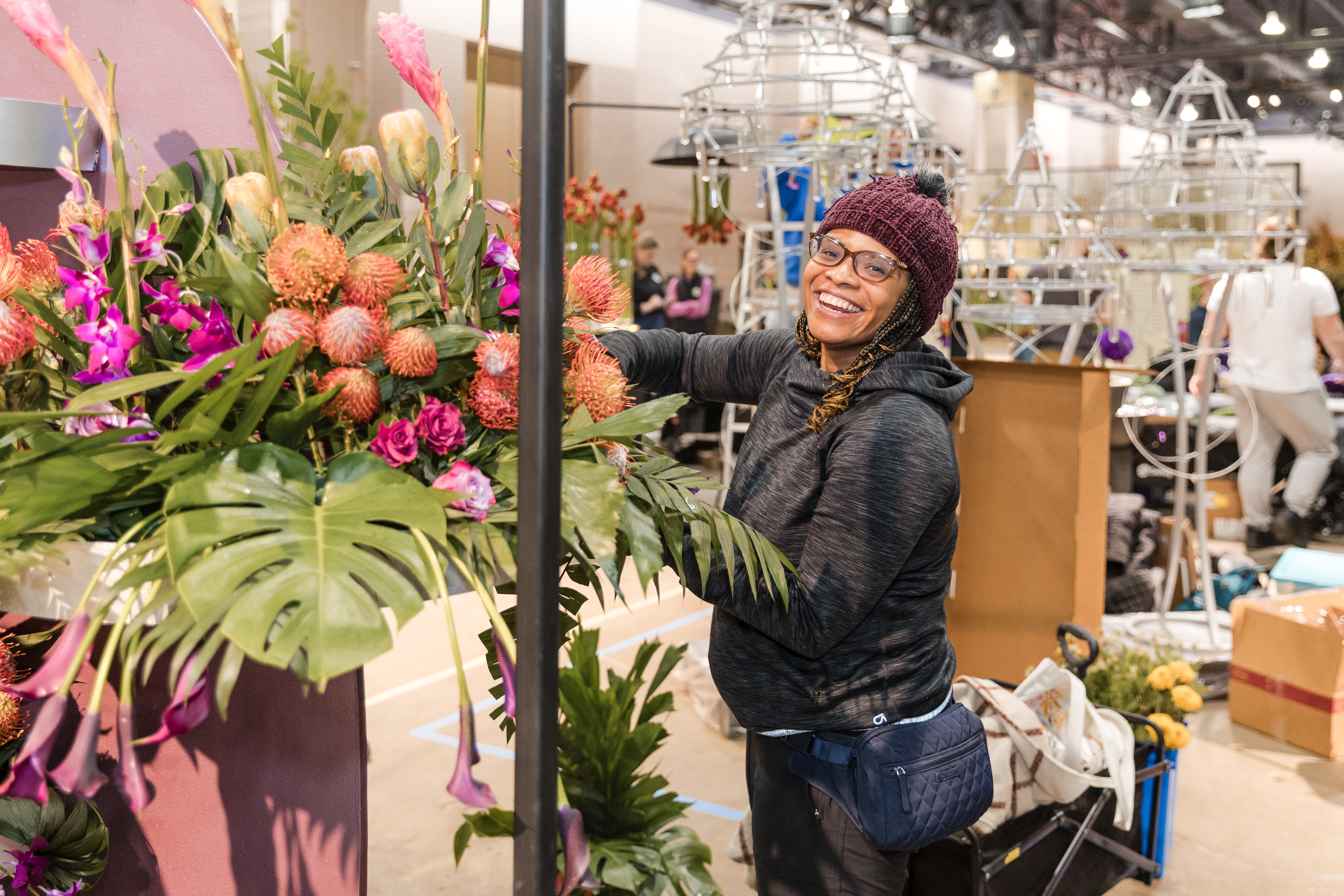 Female adjusting floral display