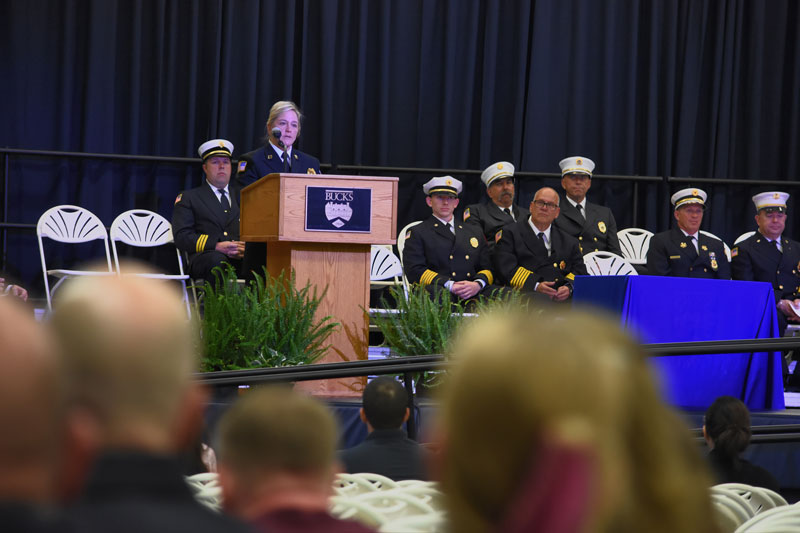 Tracie Young-Brungard of the Pennsylvania Office of the State Fire Commissioner delivers the keynote address to 46 volunteer firefighters who received their national certification from Bucks County Community College