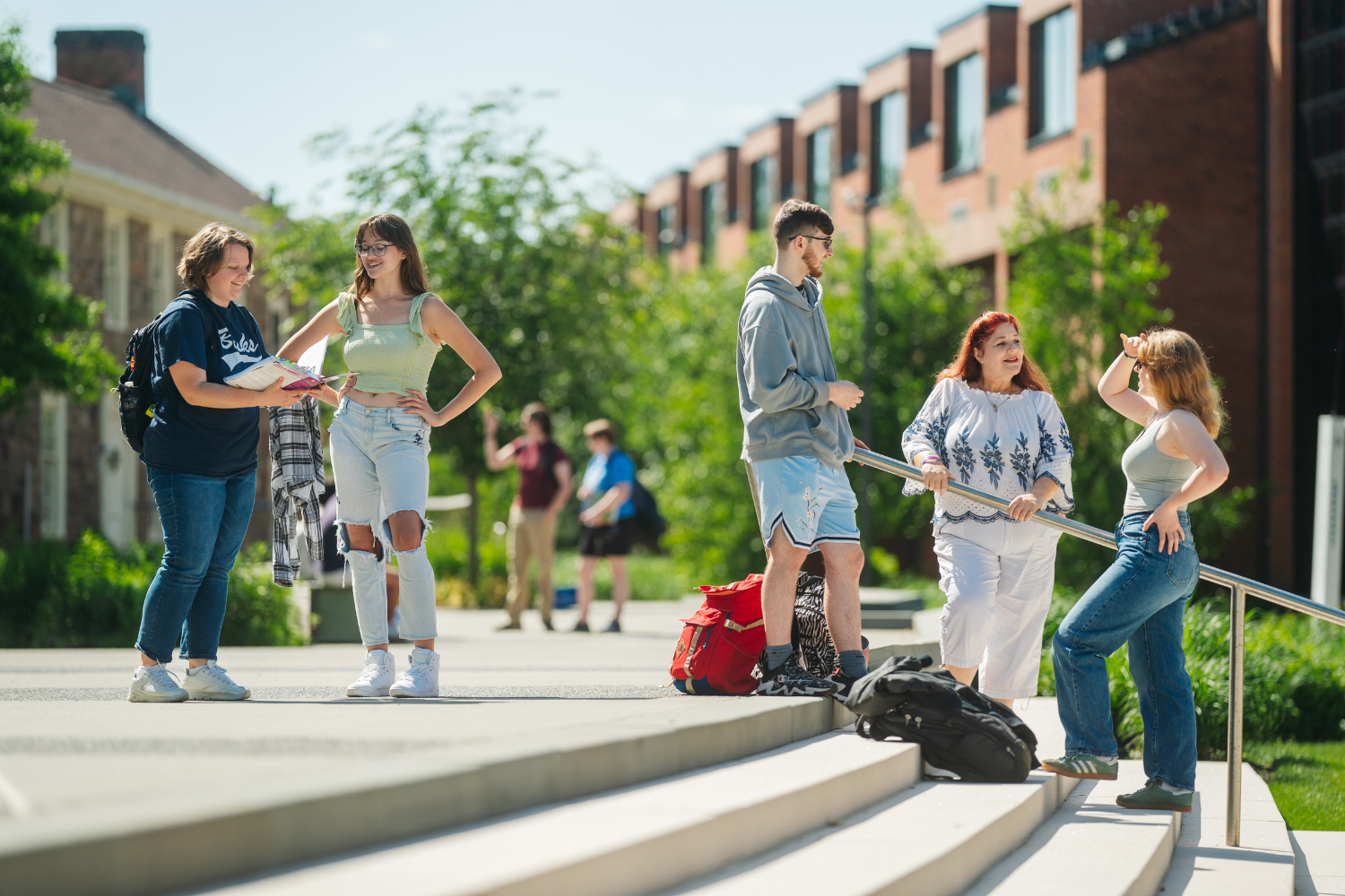 Students standing outside talking