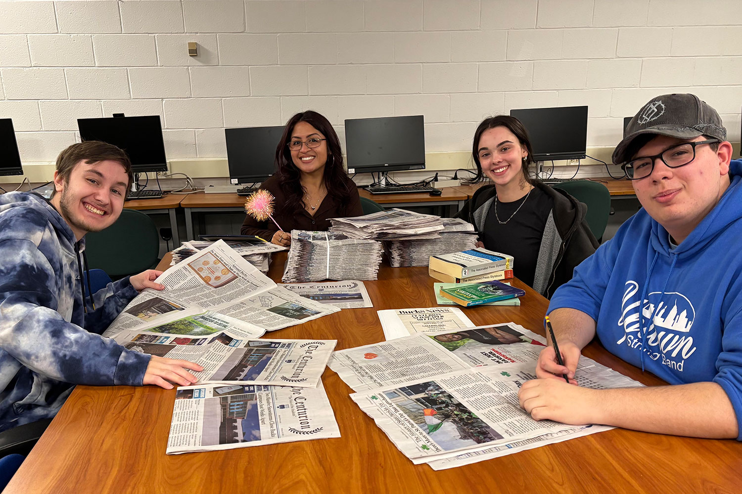 Working in The Centurion newsroom at Bucks County Community College in Newtown are some of the newspaper’s Student Keystone Media Awards winners, including (left-right) Alex Bersenev, Centurion Editor Kassandra Castillo, Emelia Yotko, and Zacchary Crain.
