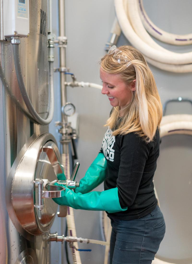 girl brewing beer