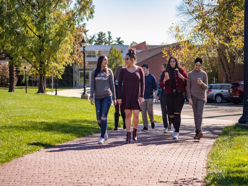 students talking outside
