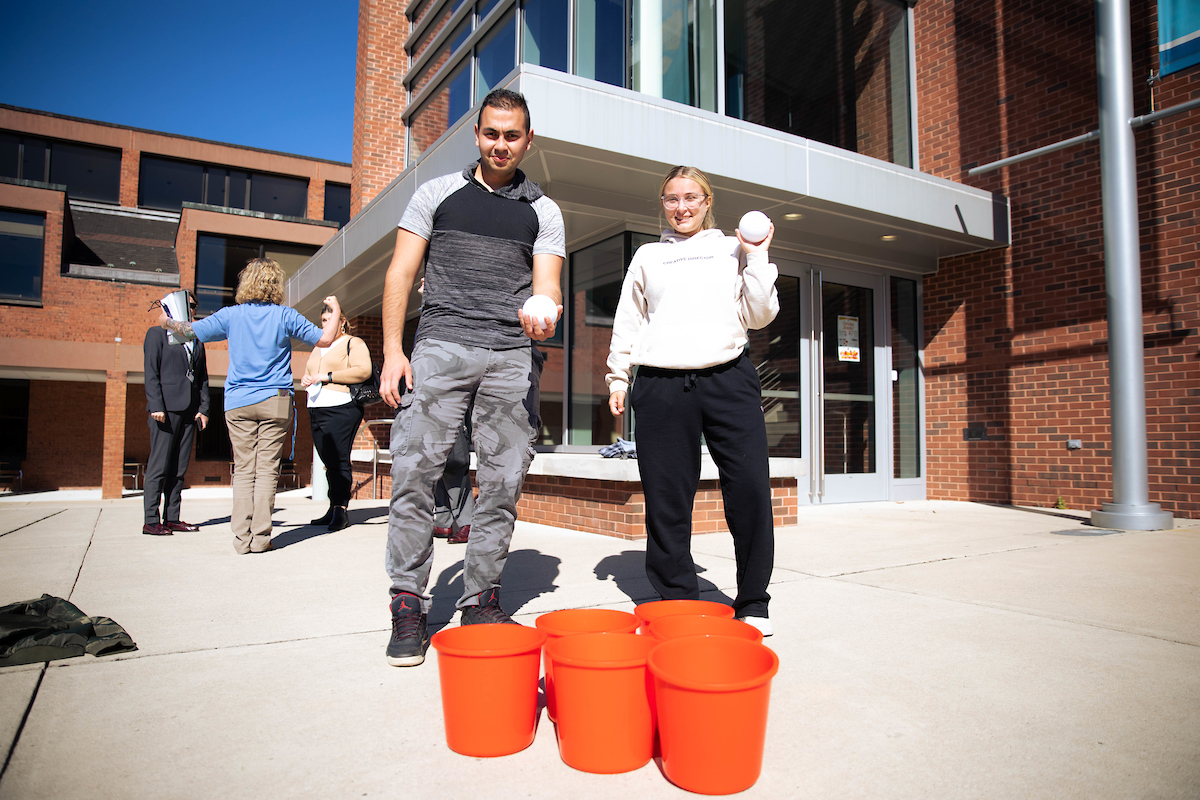 Two students playing an outdoor game