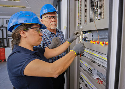 Person doing metalwork wearing protective gear